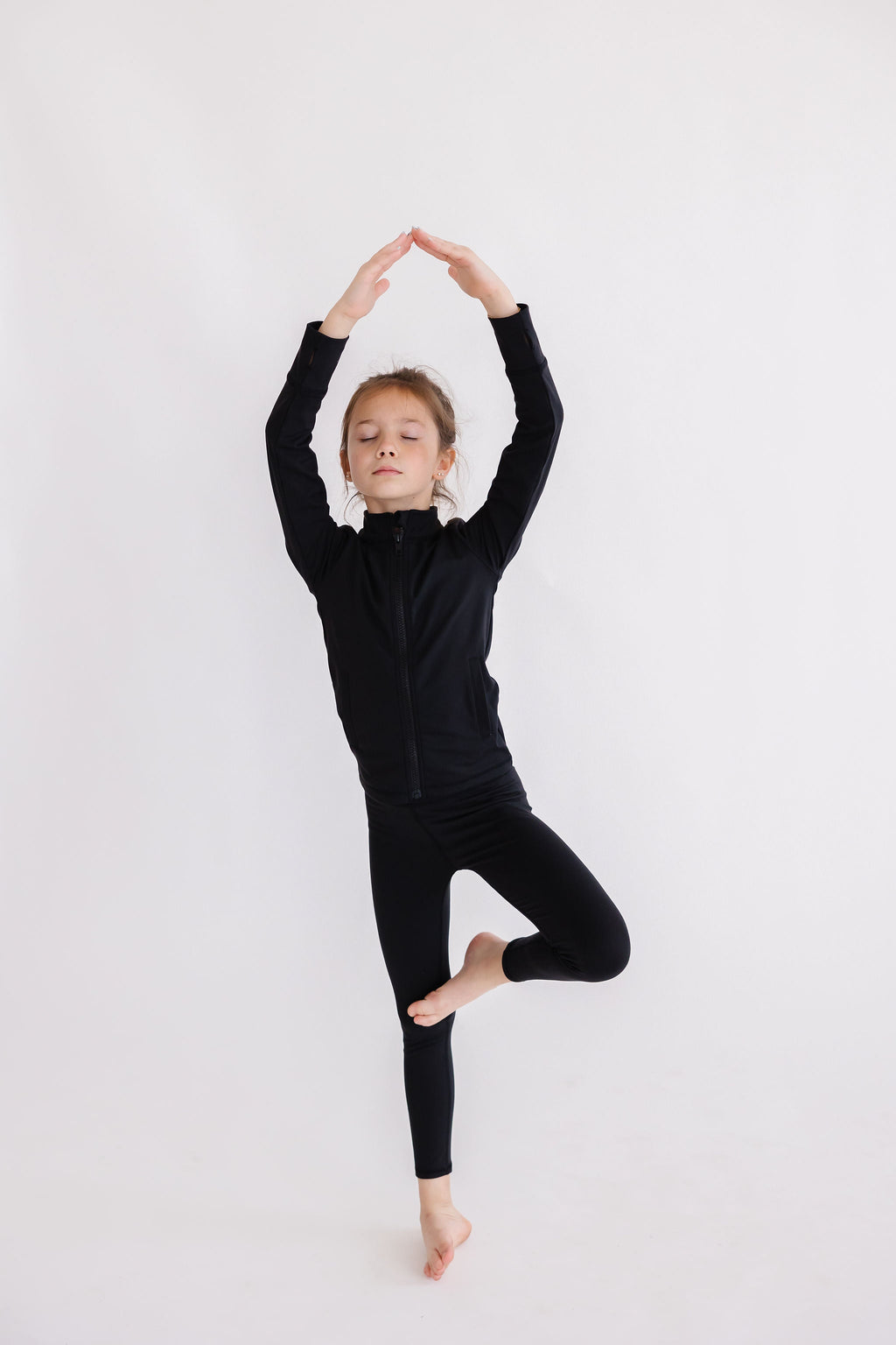 Veste active zippée à volants noir équilibré