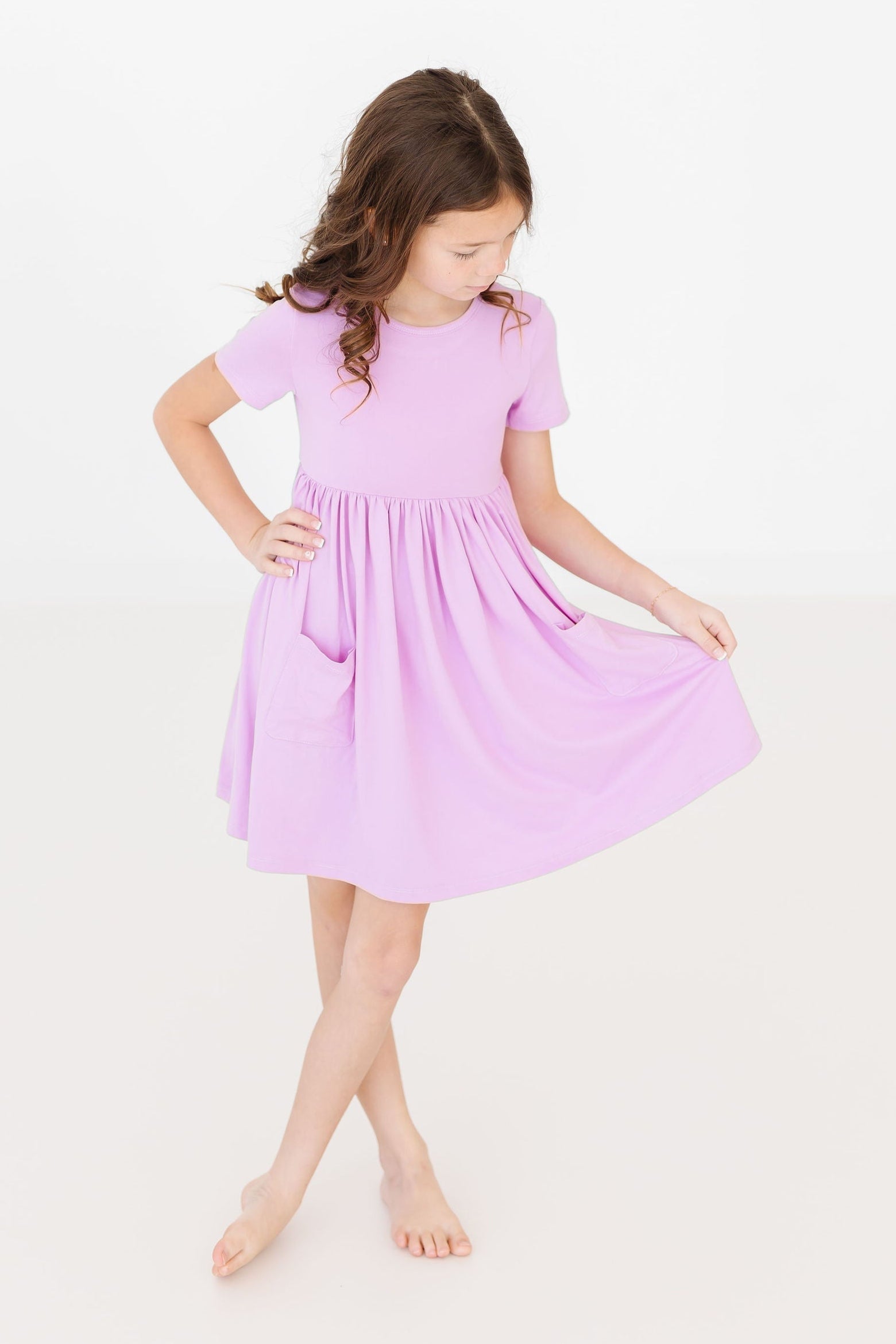 Robe virevoltante à manches courtes et poche lilas vif