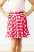 Jupe-culotte à volants rose vif vichy