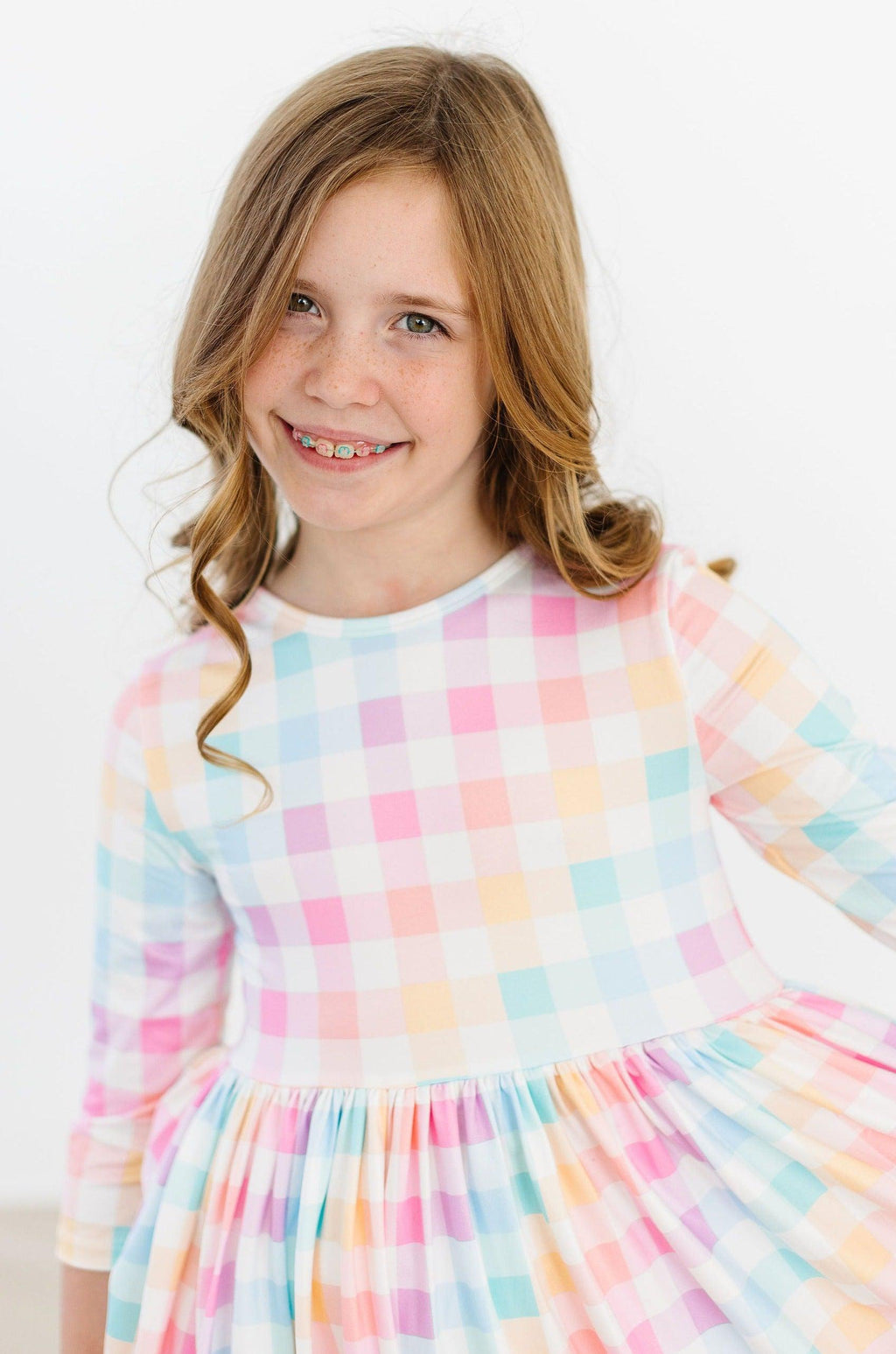 Robe virevoltante à carreaux pastel, manches 3/4 et poches