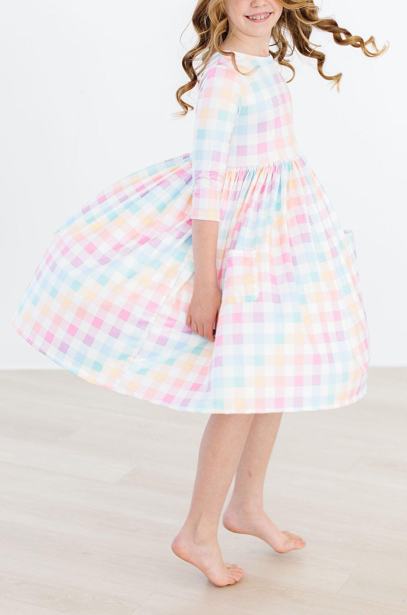 Robe virevoltante à carreaux pastel, manches 3/4 et poches