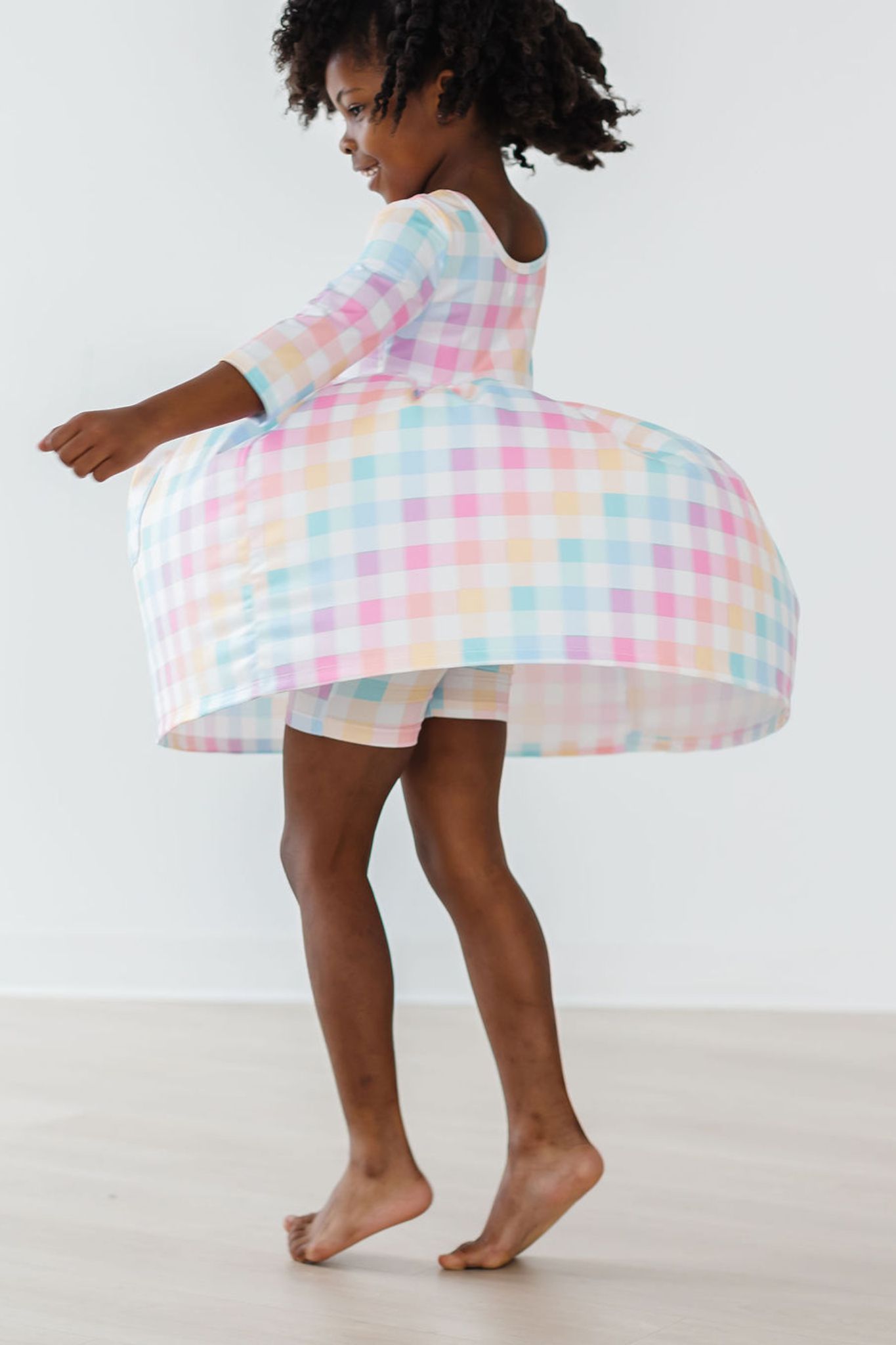 Robe virevoltante à carreaux pastel, manches 3/4 et poches