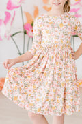 Robe virevoltante mi-longue Pretty Peachy à manches 3/4 et poches