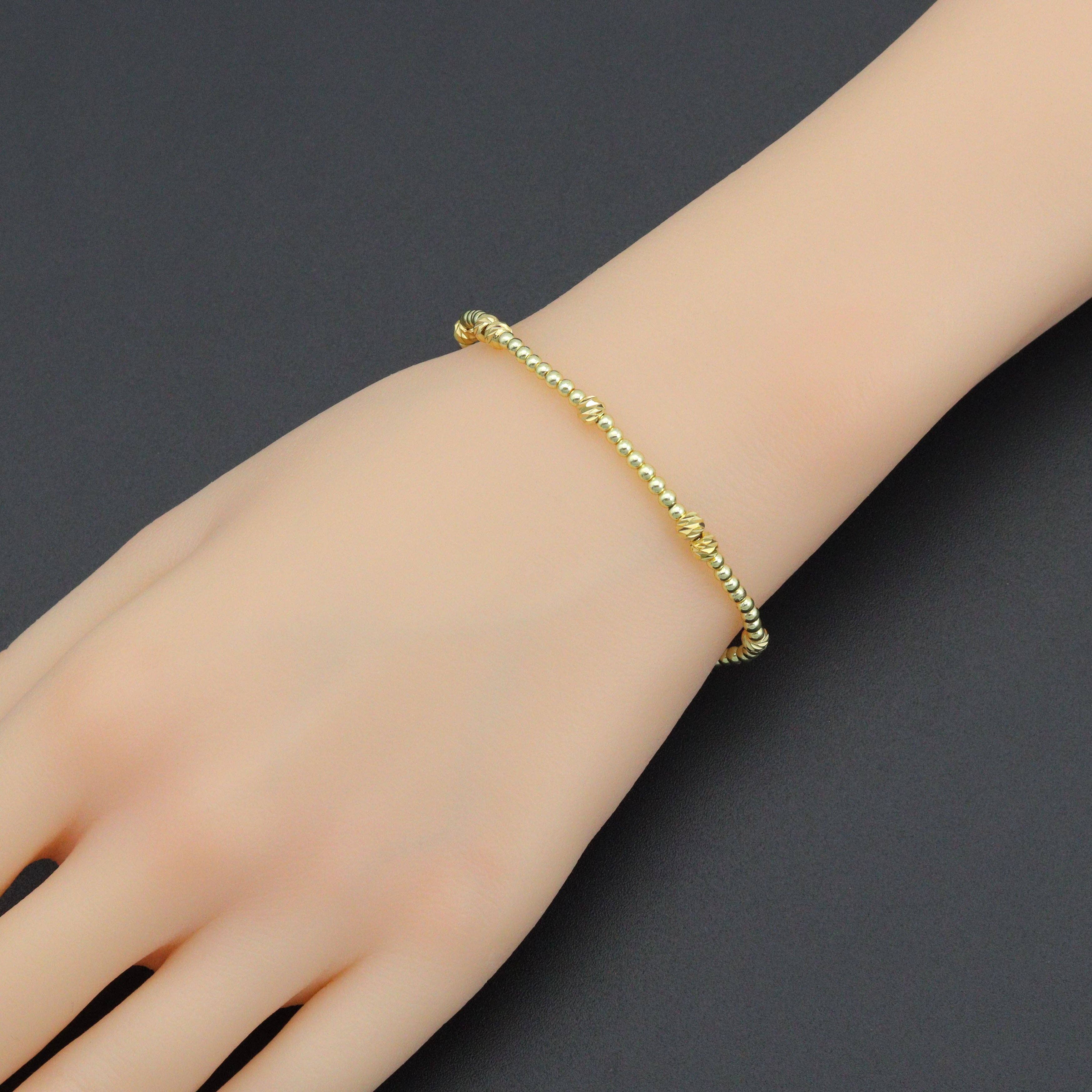 Gold Hematite with Swirl Spacer Ball Beads stretchy Bracelet, Sku#EF689