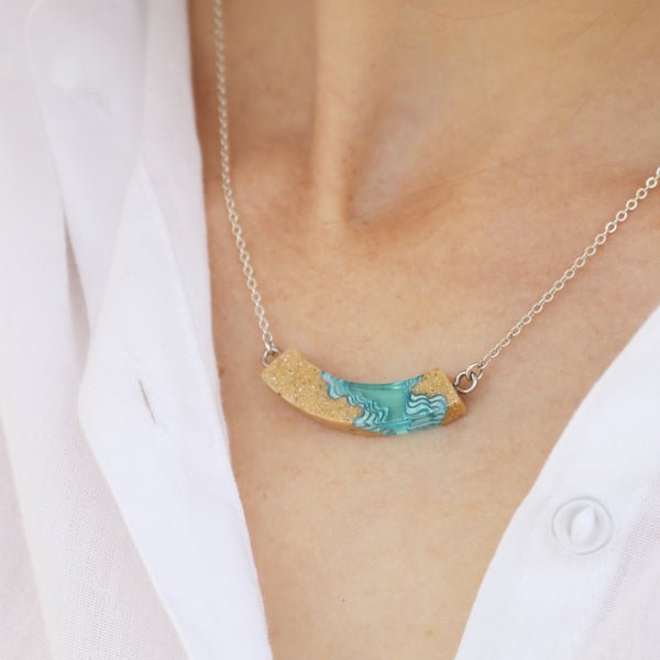 Headland Necklace – Aqua Resin & Sand Arc Pendant