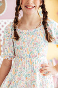Robe à volants smockée « Joyeuses Pâques »